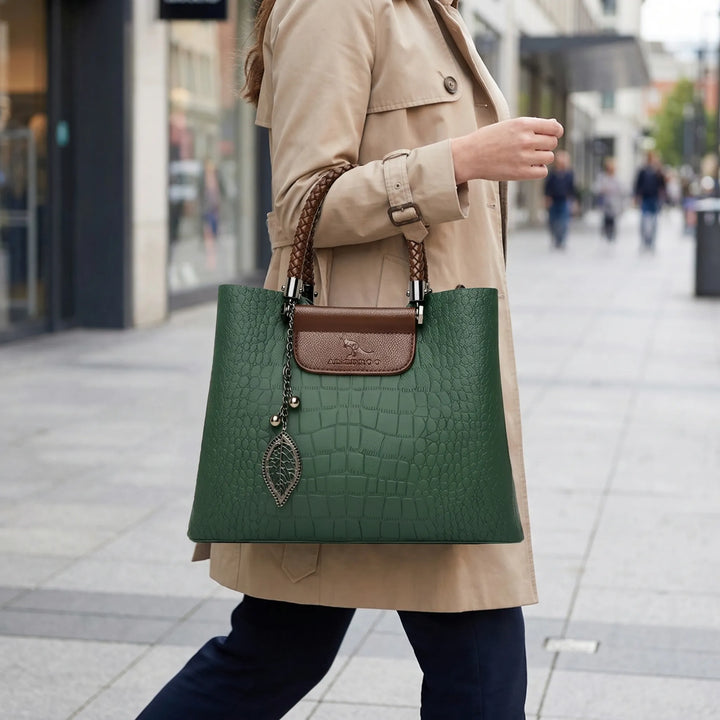 Women's embossed tote bag with braided handle. Chic & versatile shoulder handbag, perfect for daily fashion.