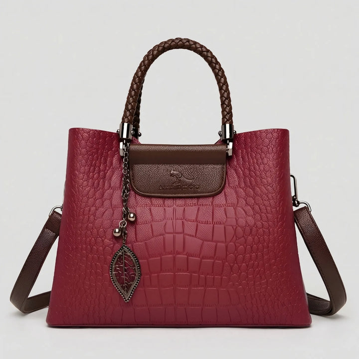 Large women's embossed tote bag with braided handle. Practical daily shoulder bag, a versatile and chic handbag.