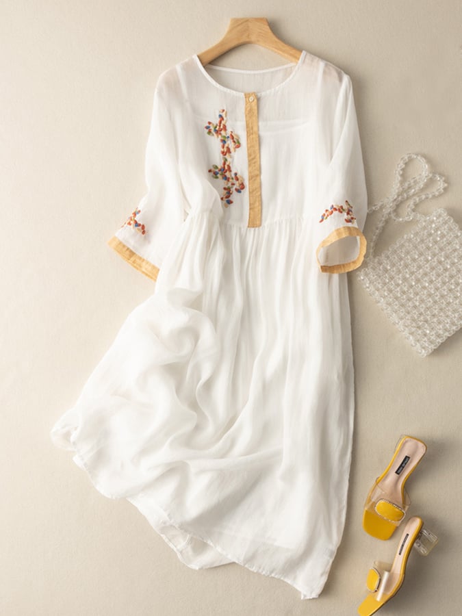 Casual women's tunic dress, embroidered and loose fit for comfortable everyday wear.