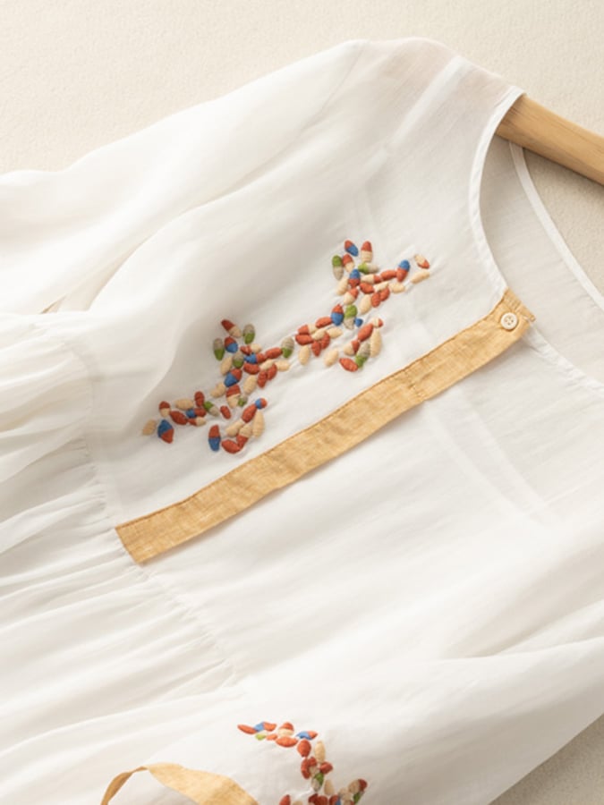 Embroidered loose fit dress for women, ideal casual summer fashion and comfortable daily wear.