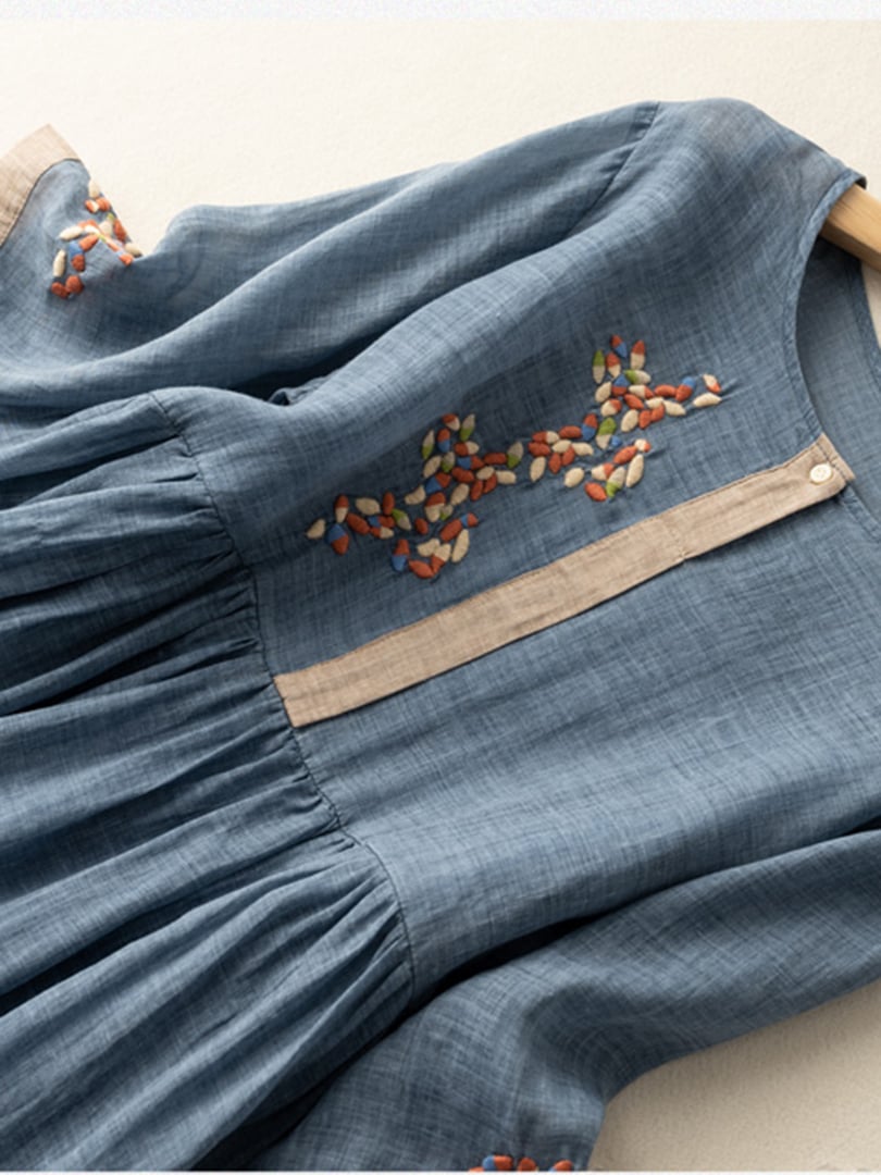 Versatile women's embroidered tunic dress, loose fit for casual comfort & elegant summer style.