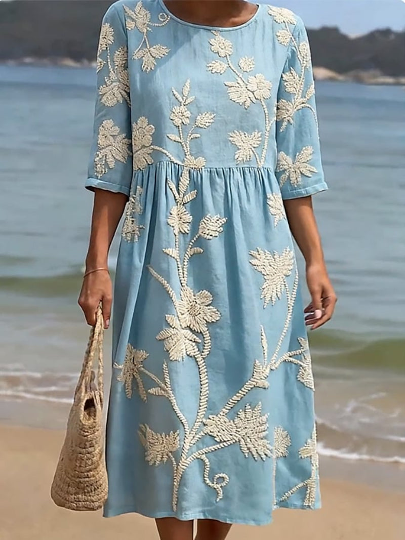 Comfortable casual embroidered midi dress for women. Features 3/4 sleeves, perfect for day wear or vacation.
