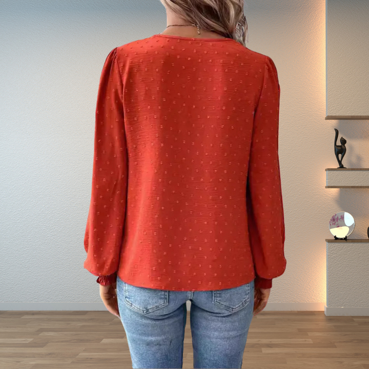 Elegant women's embroidered V-neck blouse, long sleeve top for versatile casual or dressy wear.