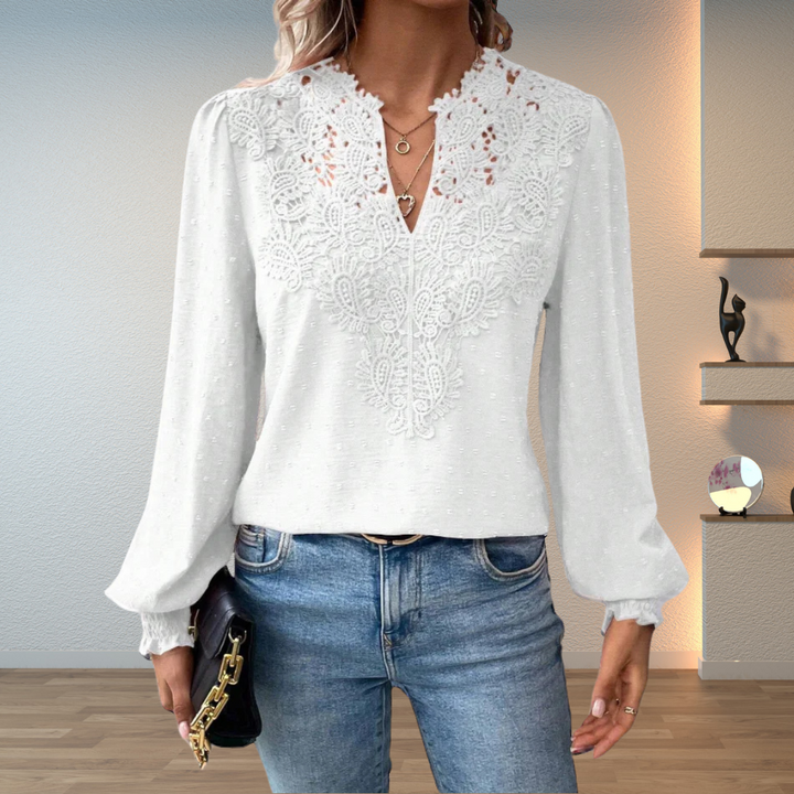 Chic embroidered V-neck long sleeve blouse for women, featuring intricate detail and a comfortable fit.
