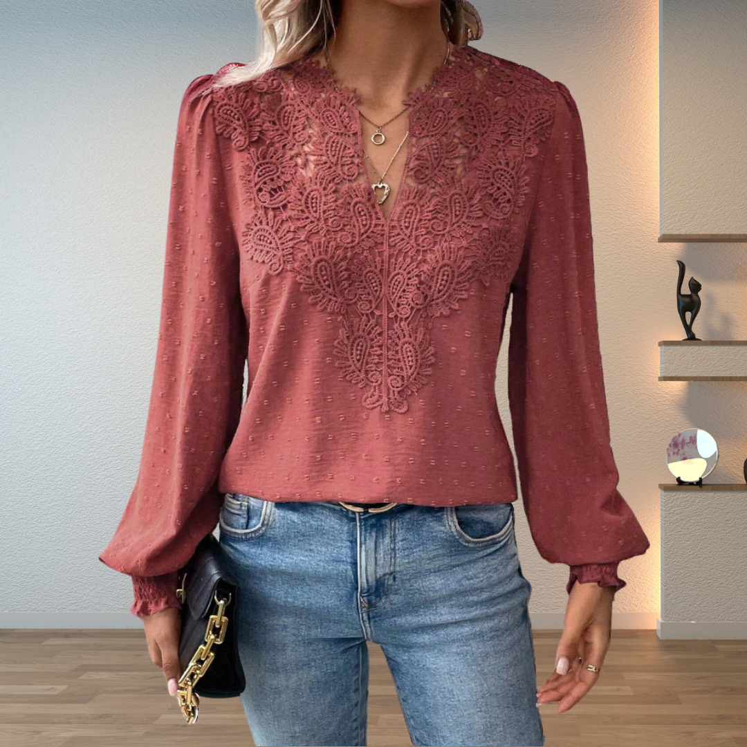 Boho chic embroidered V-neck women's blouse with long puff sleeves, ideal for spring fashion.