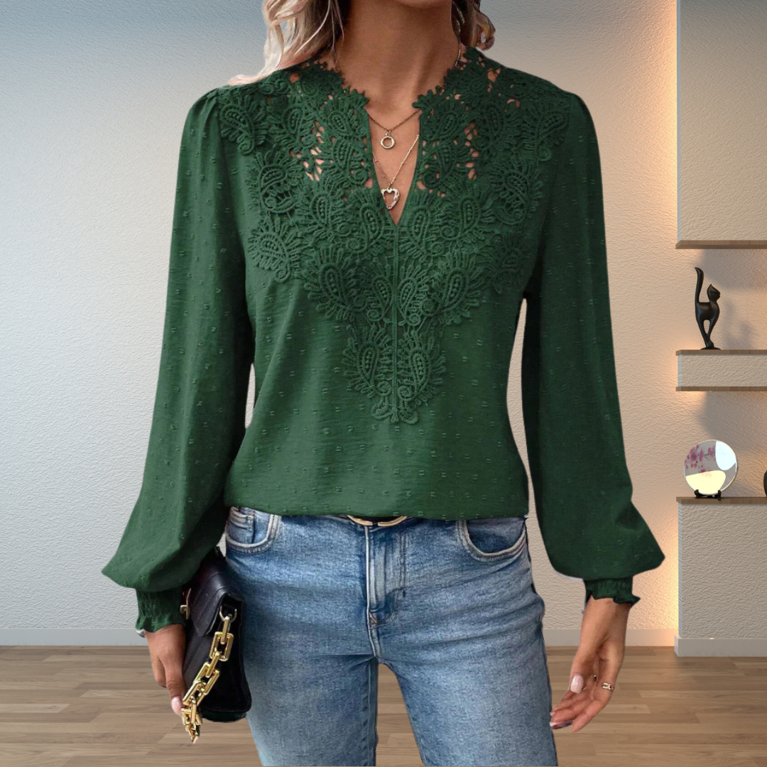 Fashionable women's embroidered V-neck top with long puff sleeves, a stylish addition to your wardrobe.