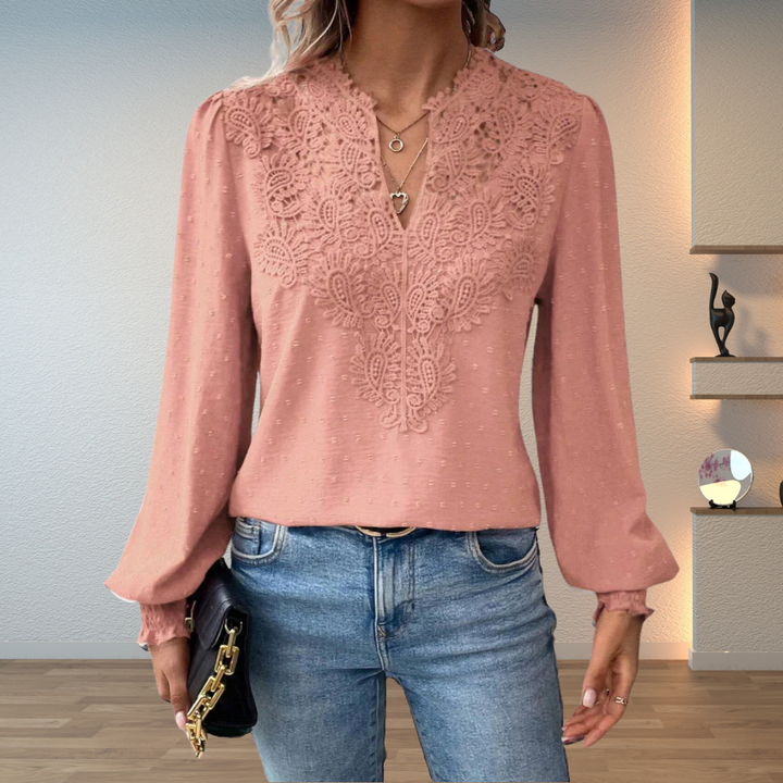 Stylish women's embroidered V-neck long sleeve top, featuring delicate embroidery and elegant puff sleeves.