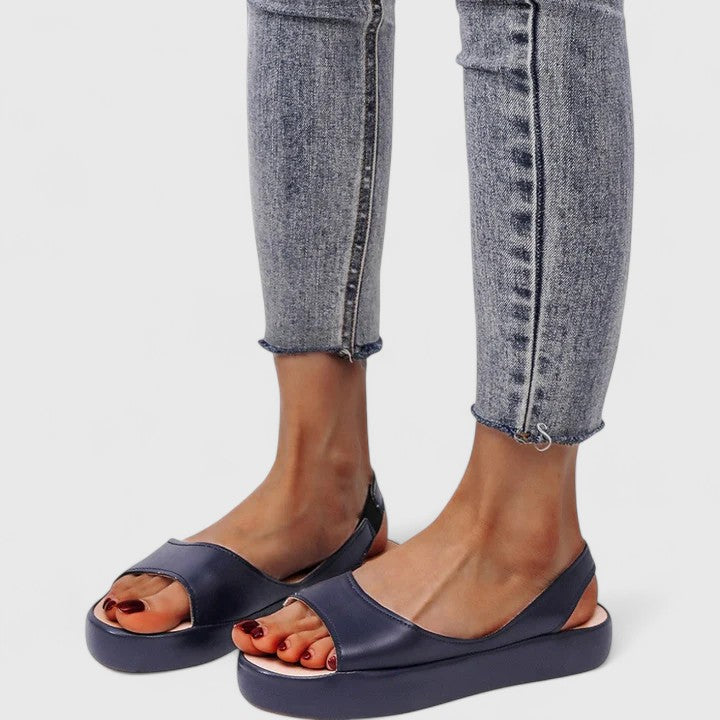 Women's Emrynn comfort sandals, orthopedic slip-on style for cushioned summer wear.
