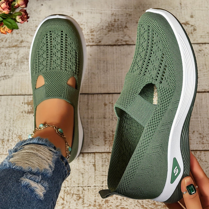 Lightweight grey slip-on sneakers for women, featuring ergonomic design for comfortable daily walking.