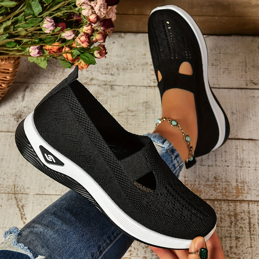 Purple women's comfortable slip-on sneakers, perfect for casual wear and all-day ergonomic support.