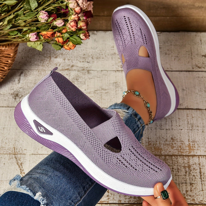 Grey ergonomic women's slip-on sneakers, designed for ultimate comfort and daily walking.