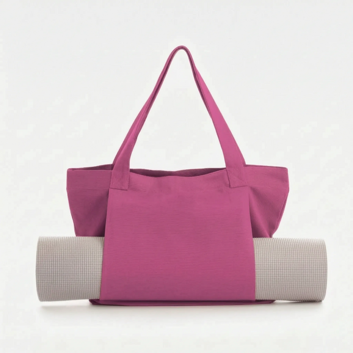 Functional women's yoga bag for mats and gear. Essential fitness tote, perfect for studio, gym, & daily use.
