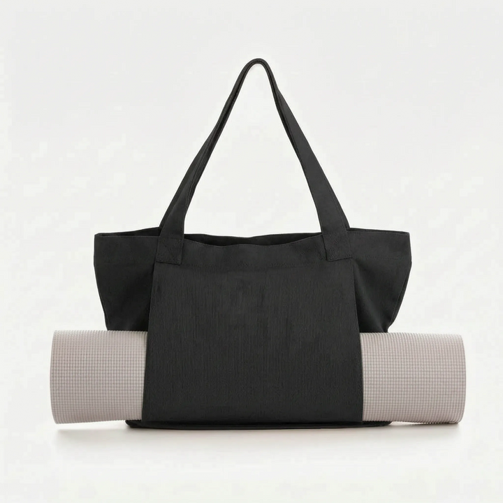 Women's daily yoga tote bag with mat holder. A practical and stylish canvas shoulder bag for active women.