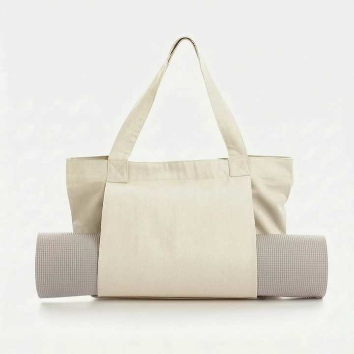 Everyday women's yoga tote bag, designed for convenience. Features a dedicated mat holder & spacious interior.