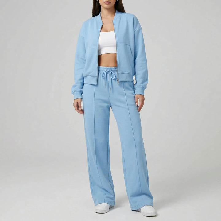 Stylish women's regular fit straight leg pants & jacket set, a timeless & adaptable wardrobe staple.