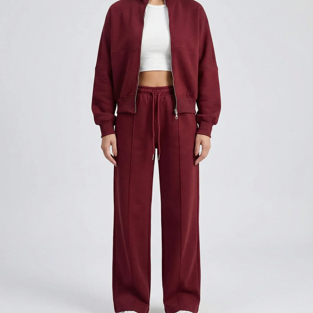 Modern women's straight leg pants and jacket set, offering a sleek regular fit and elegant silhouette.