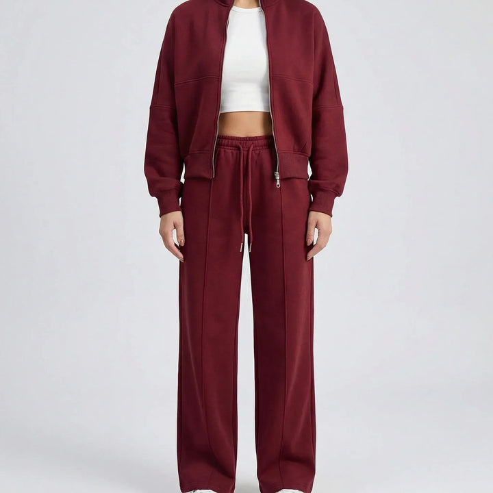 Modern women's straight leg pants and jacket set, offering a sleek regular fit and elegant silhouette.