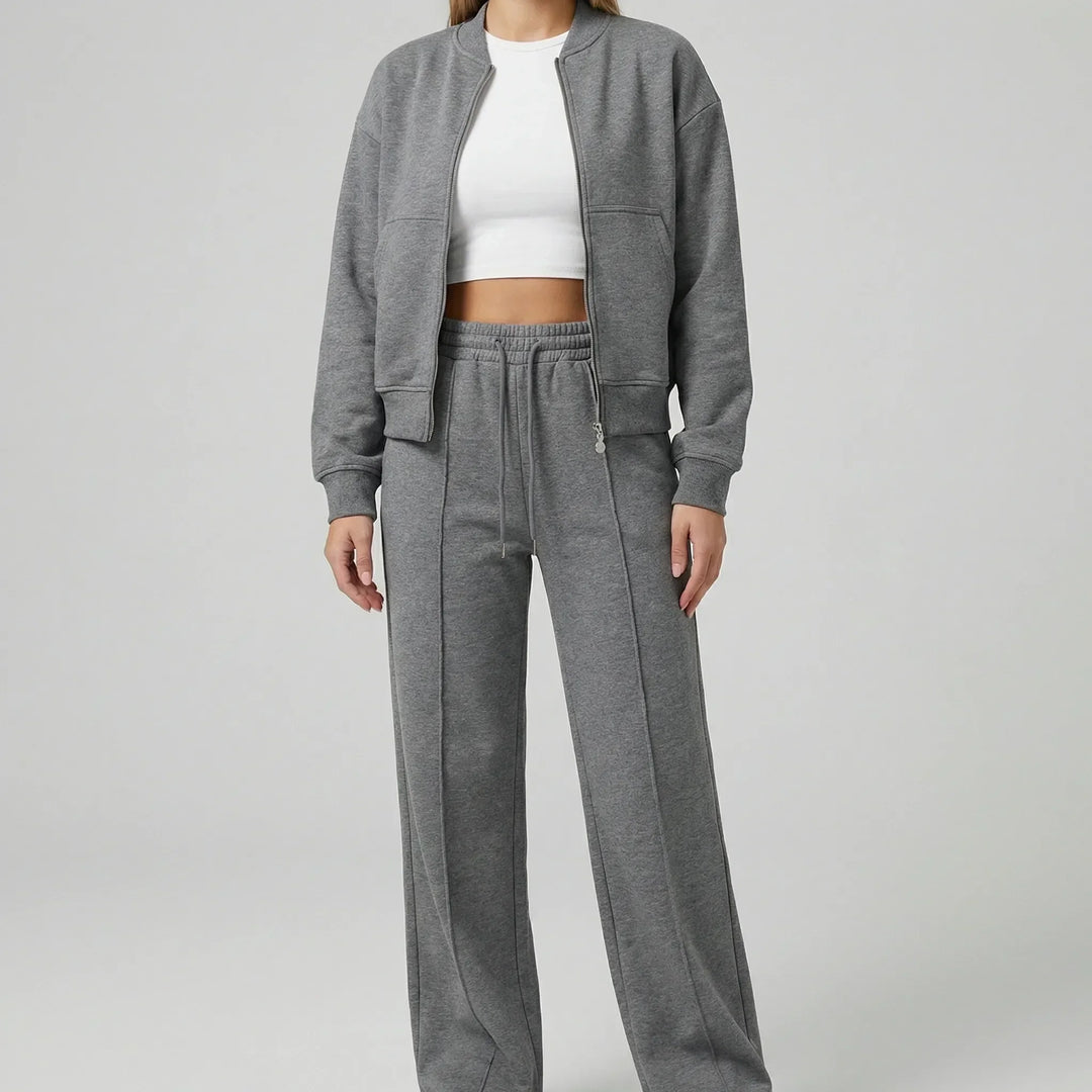Coordinated women's straight leg pants and matching jacket set, an effortless & chic ensemble.