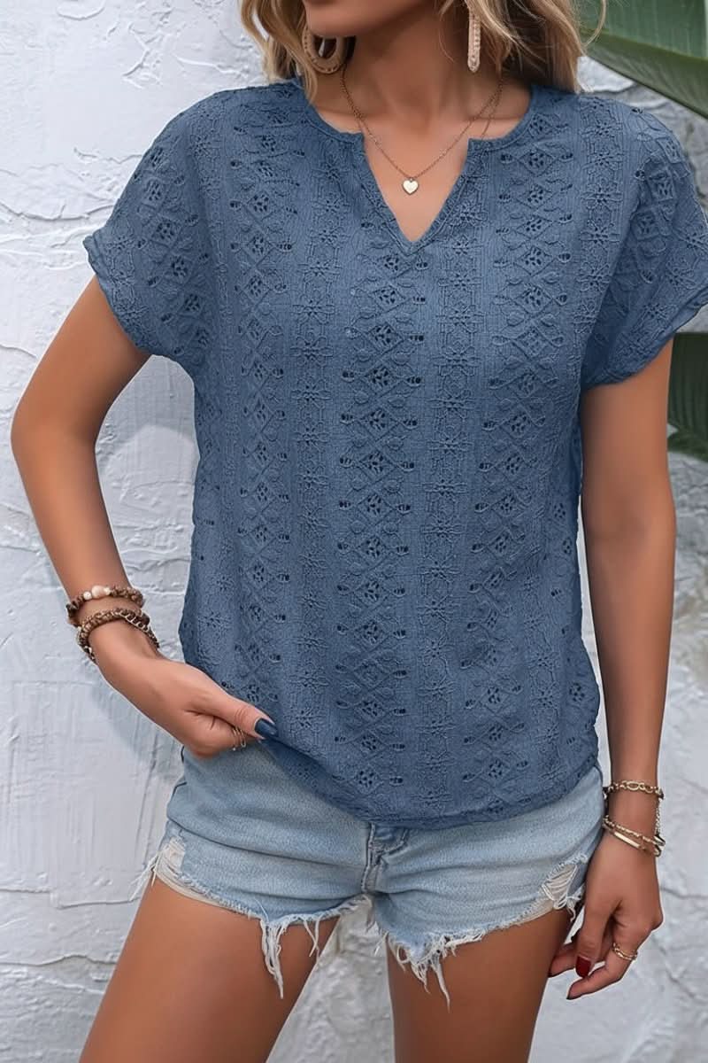 Stylish women's eyelet tee with a modern notched neckline, ideal for versatile summer fashion.