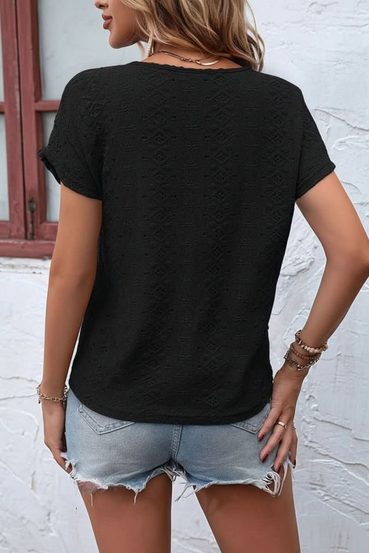 Everyday women's short sleeve top, featuring beautiful eyelet details and a flattering notched neckline.
