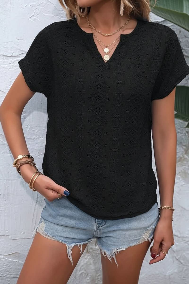 Fashionable women's tee with eyelet texture and a distinctive notched collar, perfect for casual wear.