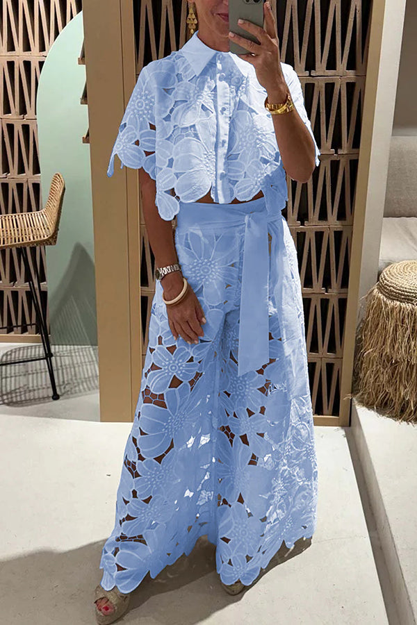 Romantic women's eyelet two-piece set with ruffle sleeves, perfect for elegant summer events & resort fashion.