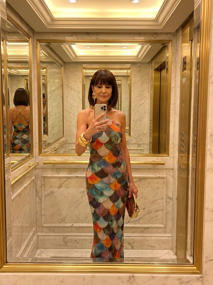 Summer-ready women's halter maxi dress with a tailored fit and eye-catching geometric print, elegant womenswear.
