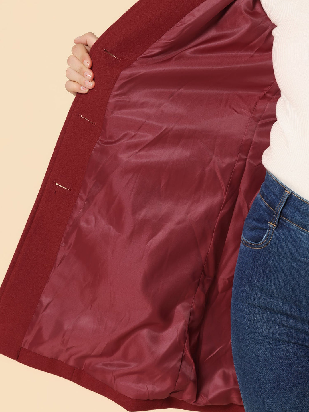 High-quality women's trench coat with a flattering fitted cut, button closure & refined structured collar.