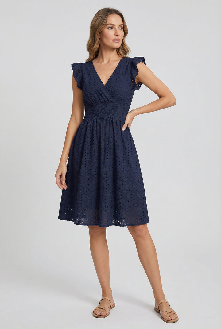 White eyelet flared midi dress for women, delicate ruffled sleeves, a must-have for summer fashion.