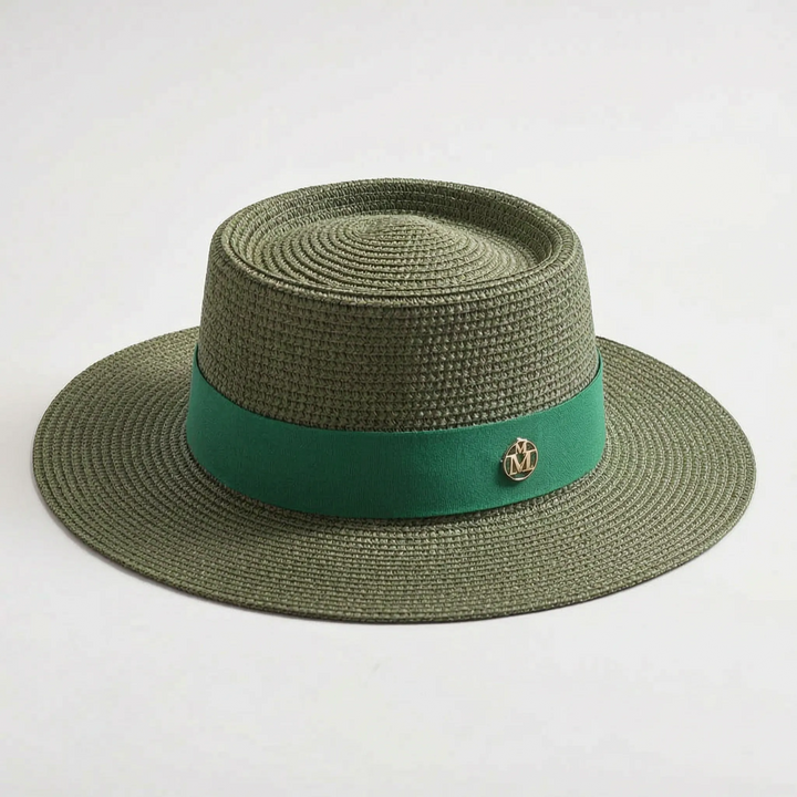 Chic women's flat top sun hat featuring a wide brim, offering stylish and functional sun protection.