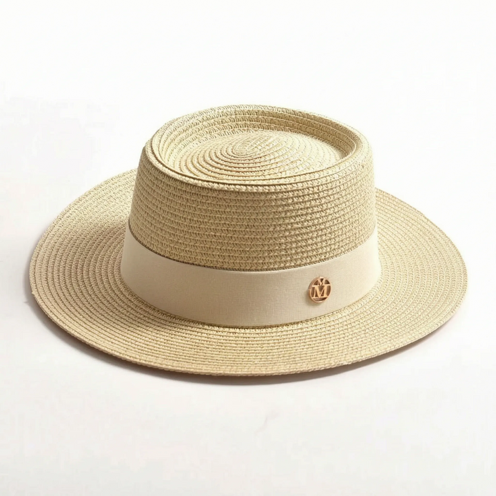 Women's wide brim flat top sun hat, a stylish and practical summer beach and vacation accessory.