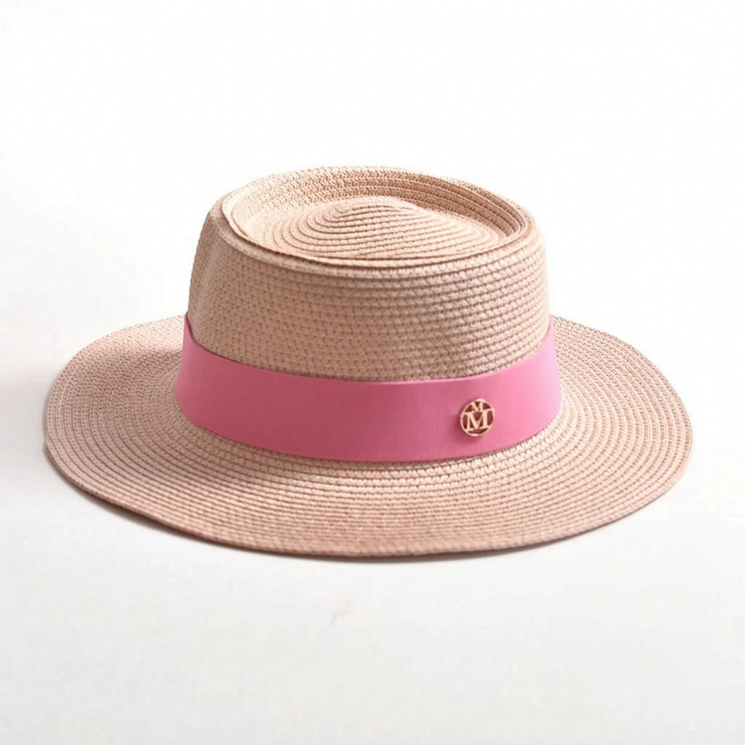 Stylish women's flat top wide brim sun hat, your perfect vacation accessory for sunny summer destinations.