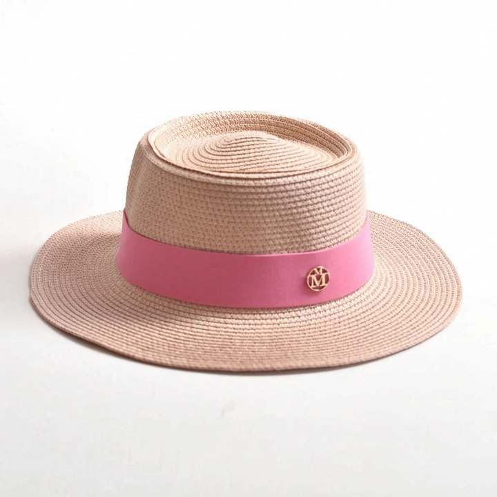 Stylish women's flat top wide brim sun hat, your perfect vacation accessory for sunny summer destinations.