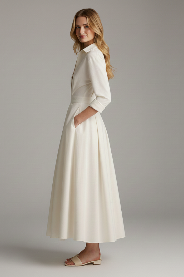 Comfortable women's collared midi dress with full button front and long sleeves. Perfect for everyday style.