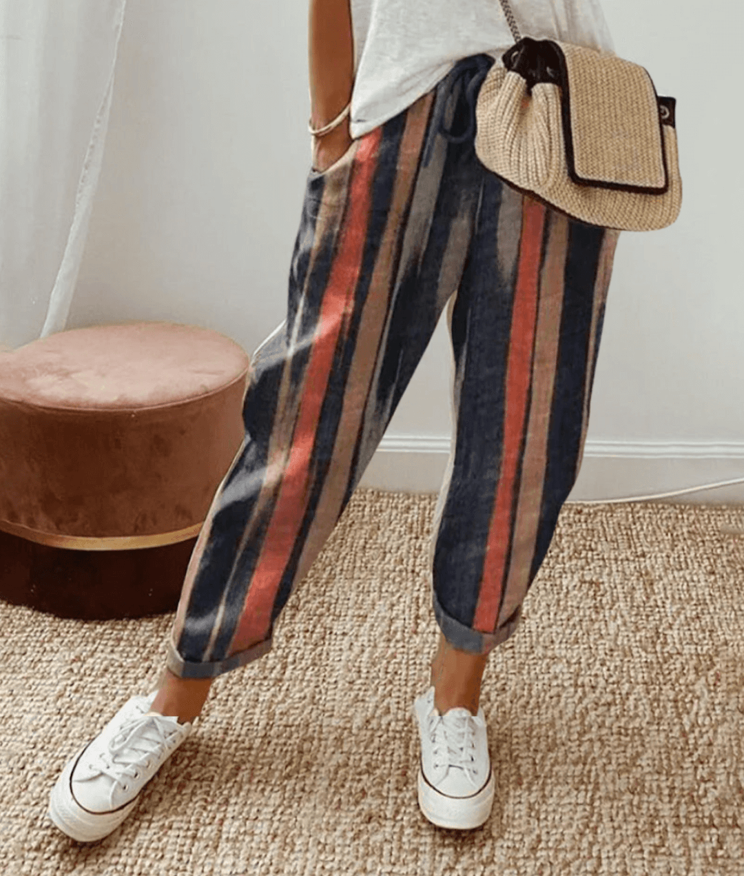 Women's flattering printed trousers with a comfortable fit & drawstring waist, perfect for versatile daily wear.
