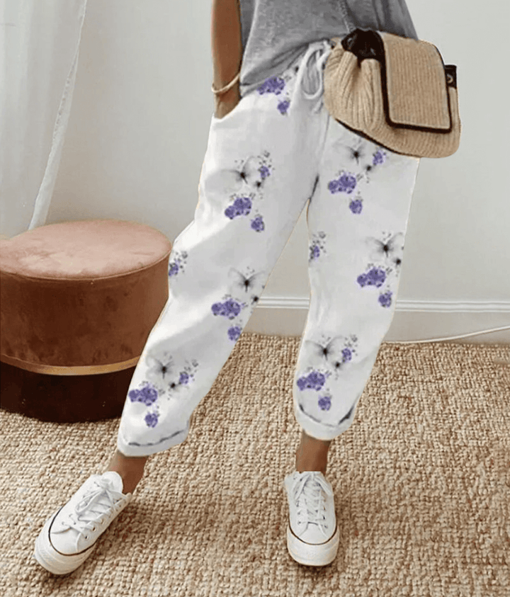Comfortable women's printed trousers with a vibrant pattern and flattering fit, ideal for modern daily wear.