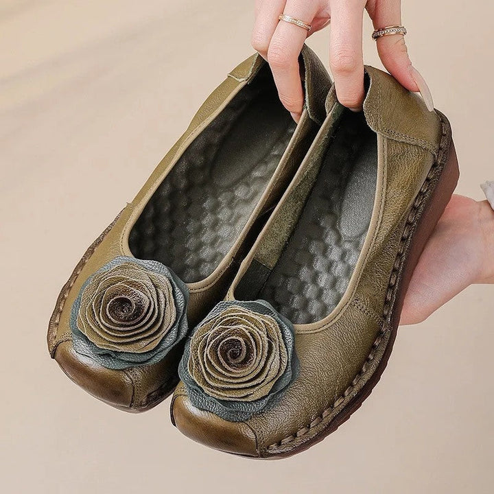 Easy slip-on comfort loafers for women, featuring a beautiful floral appliqué design.