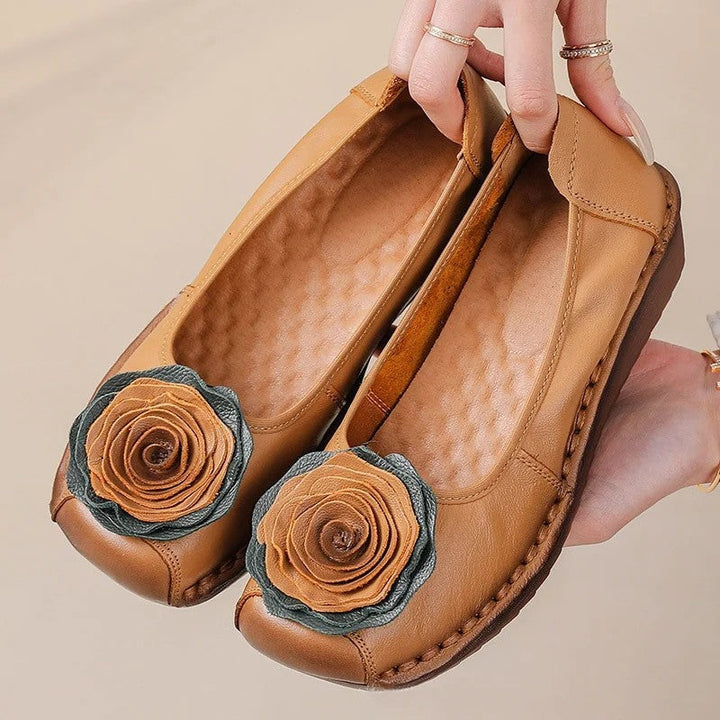 Casual women's footwear: Floral appliqué slip-on loafers for everyday comfort & style.