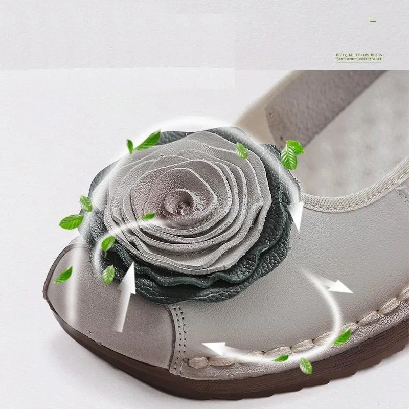 Versatile women's comfort loafers with charming floral appliqué, easy slip-on style.