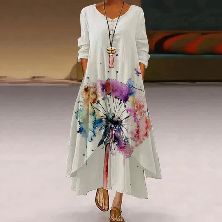 Relaxed fit women's long sleeve maxi dress with a stylish floral border print, perfect for casual days.