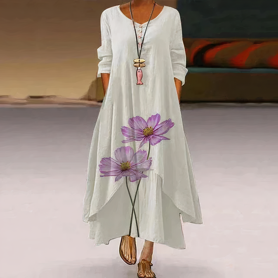 Chic women's oversized long sleeve maxi dress with an elegant floral border print. Versatile & comfy.