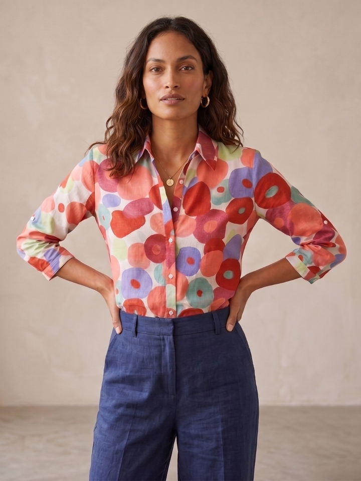 Women's floral button-down blouse with roll-tab sleeves & relaxed fit. Perfect for casual spring & summer daily wear.