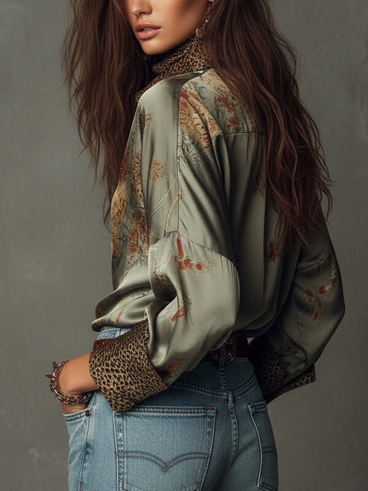 Chic floral long-sleeve button-down shirt for women, detailed with stylish leopard print trim.