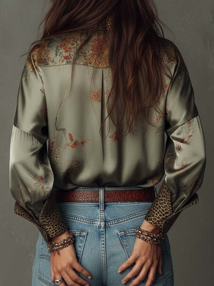 Versatile women's floral top with leopard print cuffs & collar, a fashionable button-down blouse.