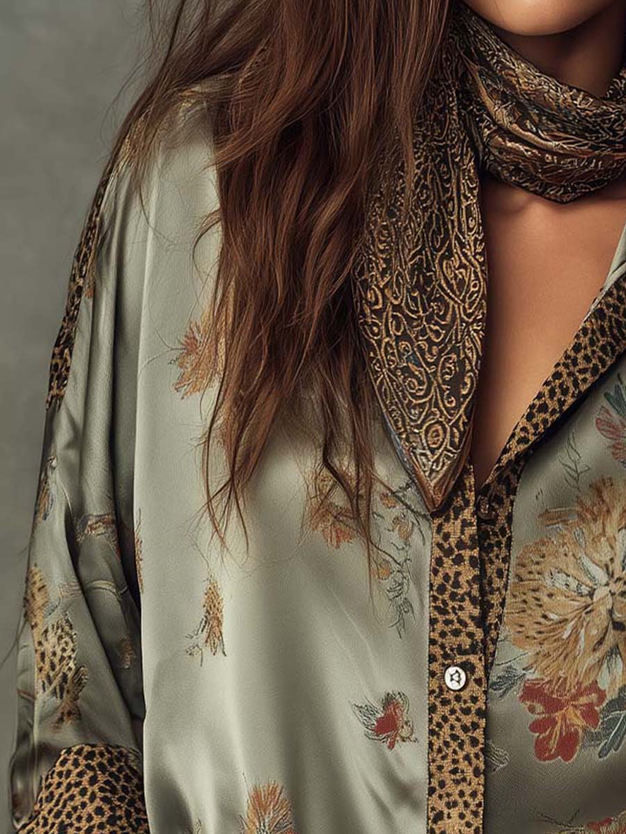 Women's long-sleeve floral button-down shirt, a versatile top with trendy leopard print details.