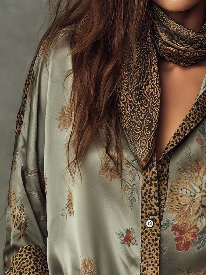 Women's long-sleeve floral button-down shirt, a versatile top with trendy leopard print details.