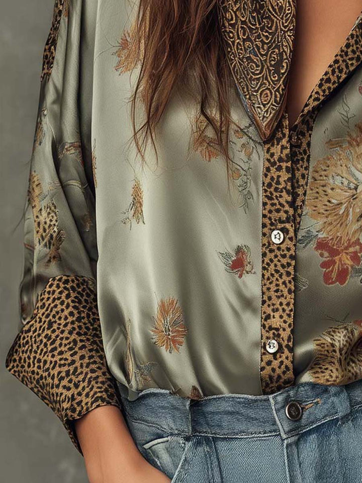 Fashionable women's floral blouse, button-down style with eye-catching leopard print trim.