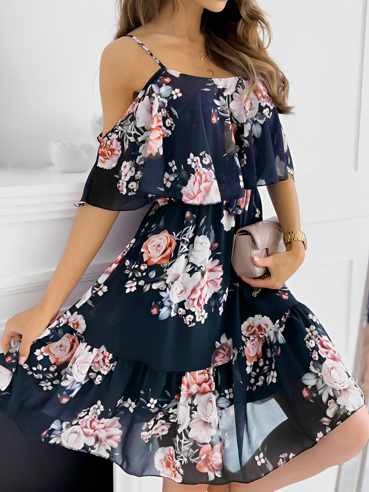 Women's pretty floral cold shoulder dress with flowy ruffles. Short length, great for summer events.
