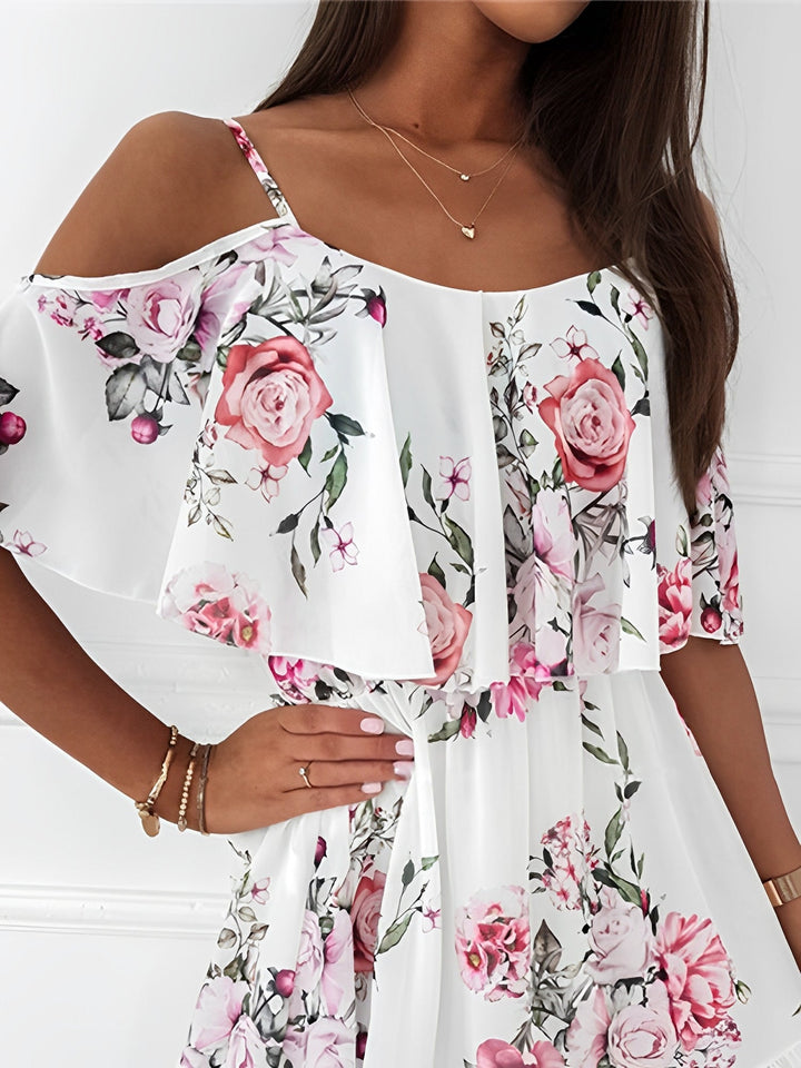 Chic women's floral mini dress, cold shoulder & flowy ruffles. Ideal short dress for spring fashion.