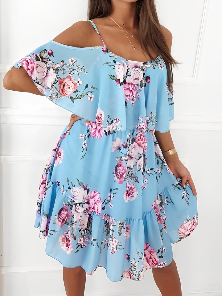 Women's flowy ruffle floral mini dress. Cold shoulder design, comfortable and stylish for summer fashion.